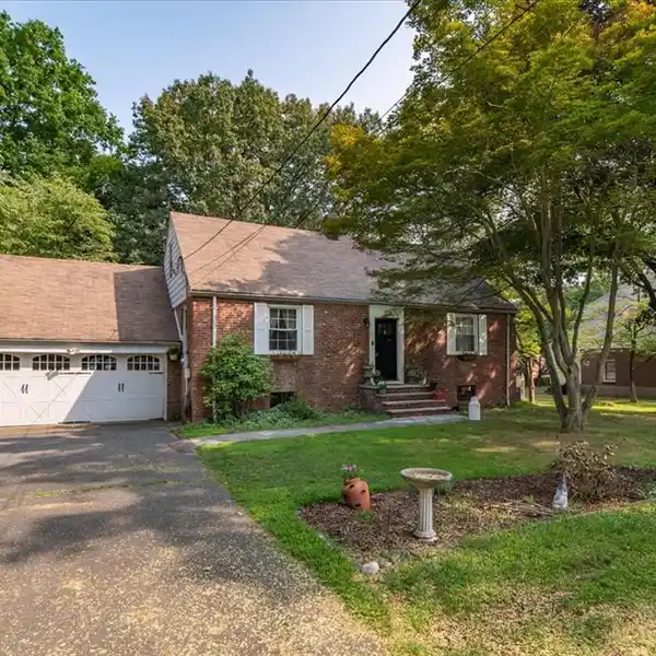 RENOVATED COLONIAL CAPE ON NEARLY AN ACRE