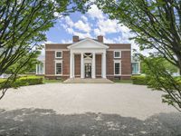 REGAL WATERFRONT ESTATE IN COVETED MEAD POINT