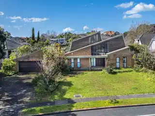 Brick and Cedar Home with North-Facing Backyard