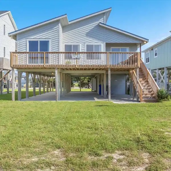 STEPS FROM THE SHORE, DESIGNED FOR COASTAL LIVING