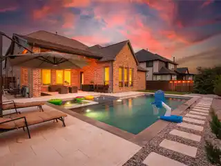 Custom Stunner with Pool in Windsong Ranch