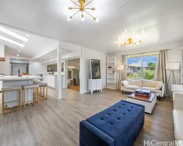 UPGRADED PLANTATION-STYLE HOME NEAR THE BEACH