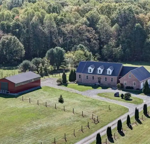 CUSTOM BRICK RETREAT WITH POOL AND EQUESTRIAN BARN