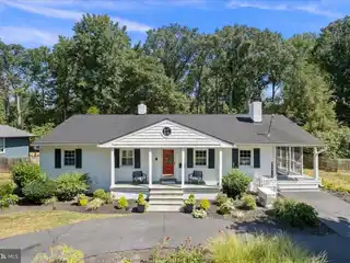 Turnkey Rambler with High-End Thermador Kitchen and Expansive Grounds