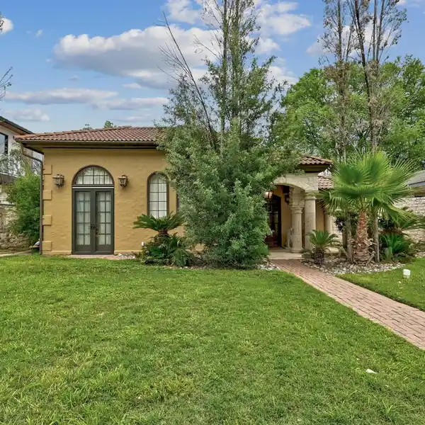 MEDITERRANEAN LAKE AUSTIN BUNGALOW WITH A PRIVATE BOAT DOCK