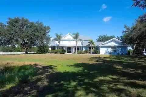 Gated Luxury Home with Oak-Lined Driveway