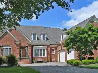 Gorgeous Pond-front Brick Home