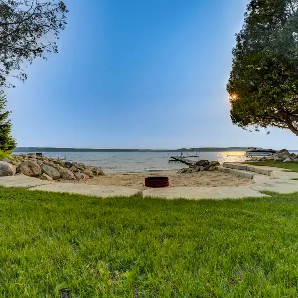 RARE SANDY BEACH LAKEFRONT PROPERTY