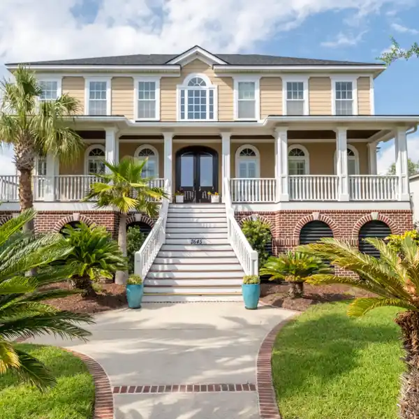 CUSTOM ELEVATED HOME IN RIVERTOWNE COUNTRY CLUB