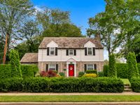 CHARMING STONE COLONIAL IN THE VERY DESIRABLE WESTERN SECTION OF GARDEN CITY
