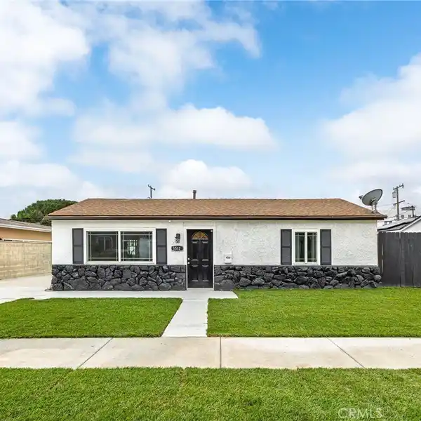 UPDATED HOME WITH SPACIOUS BACKYARD OASIS