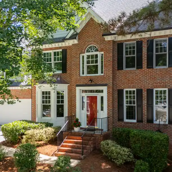 STATELY BRICK-FRONT HOME IN BELOVED WELLSLEY