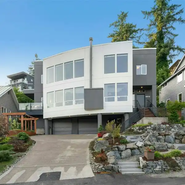 IMMACULATE CONTEMPORARY SITTING ABOVE JUANITA BAY