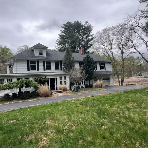 OPPORTUNITY TO FINISH A HOME ON EXPANSIVE ACREAGE