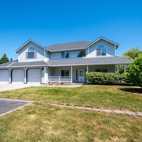 SPACIOUS CUSTOM HOME IN A PEACEFUL SETTING