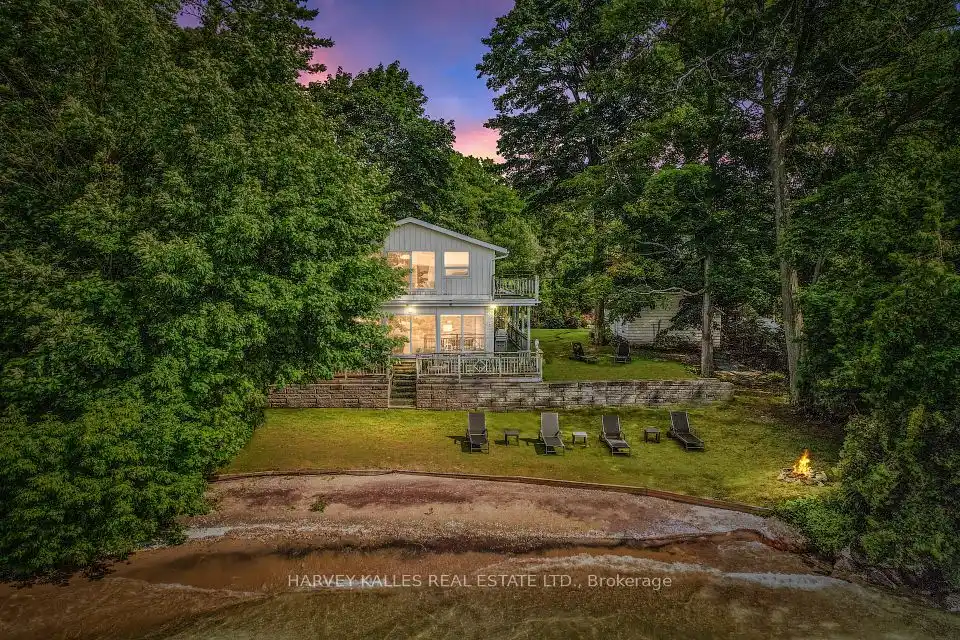 Rare Waterfront Home with Private Beach