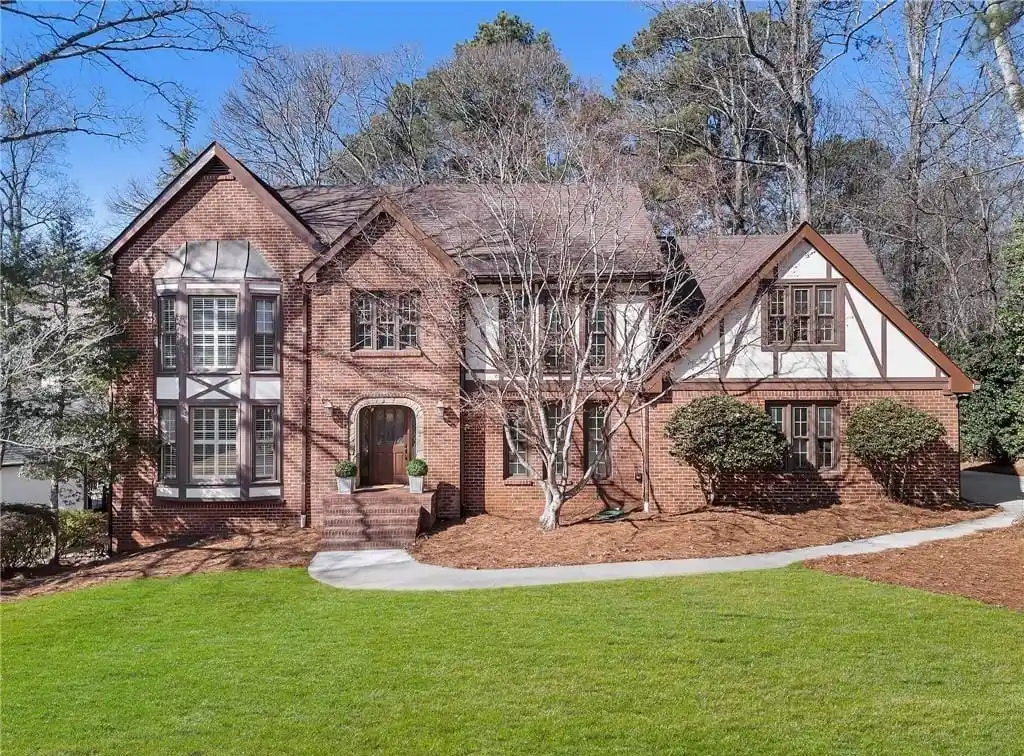 Tudor-style Home in Sought-after Sibley Forest