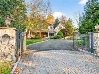 Meticulously Designed Home with a Football Field Like Backyard