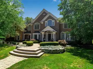 Exquisite Williamsville Estate with Resort-Style Backyard