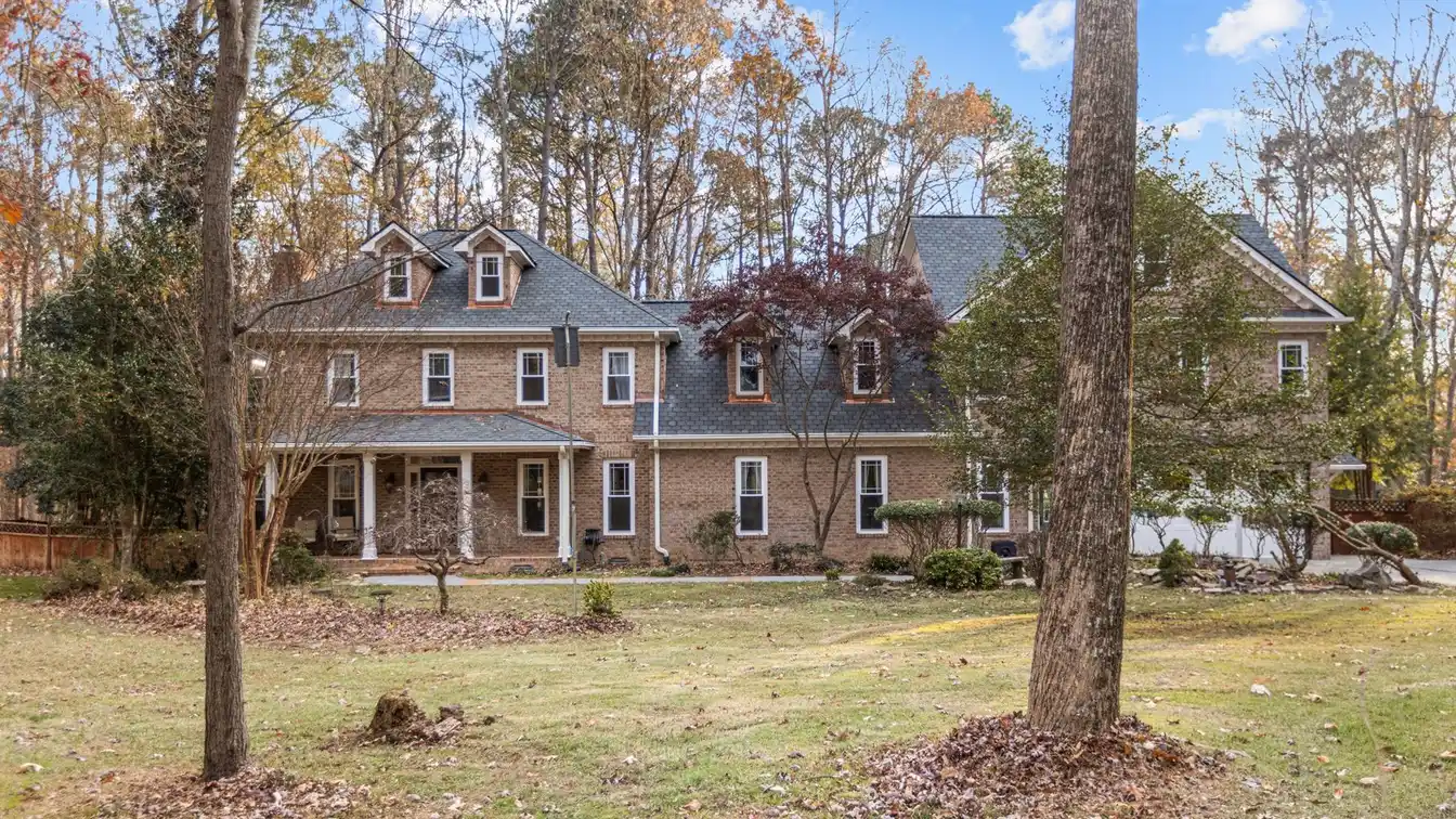All Brick Estate Home in Sought-after Enchanted Oaks