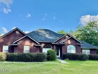 Meticulously Maintained Single-Story Brick Home on 20 Acres