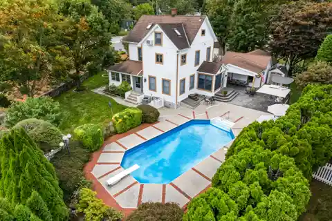 Gracious Colonial on a Beautifully Landscaped .34-Acre Property