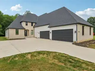 Bold New-Build with Acre of Wooded Privacy