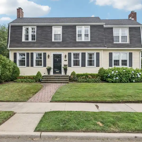 DELIGHTFUL COLONIAL HOME NESTLED ON PRIME CORNER LOT
