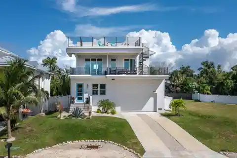 Stunning Luxury Retreat in Highly Sought After Village of Longboat Key