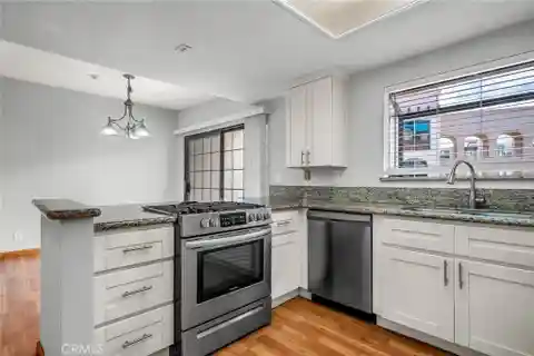 Rare Townhouse-Style Condo with Private Garage
