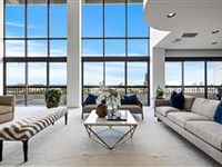 IMPRESSIVE MODERN TWO-STORY PENTHOUSE WITH SKYLINE VIEWS