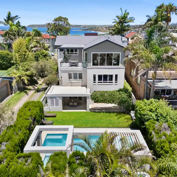 EXCEPTIONAL MASTER-BUILT RESIDENCE IN COVETED POSITION