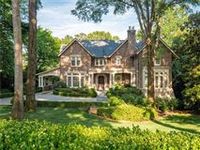 BEAUTIFULLY DESIGNED CUSTOM HOME ON MANICURED GROUNDS