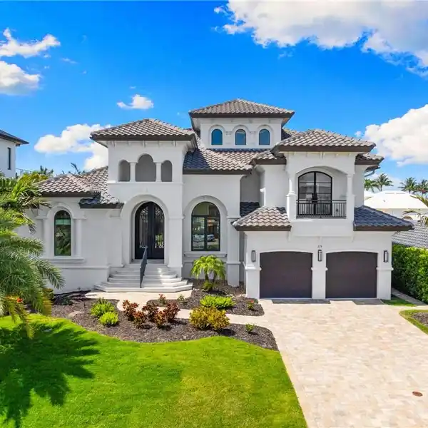 EXQUISITE WATERFRONT HOME IN THE PRESTIGIOUS CONNERS COMMUNITY