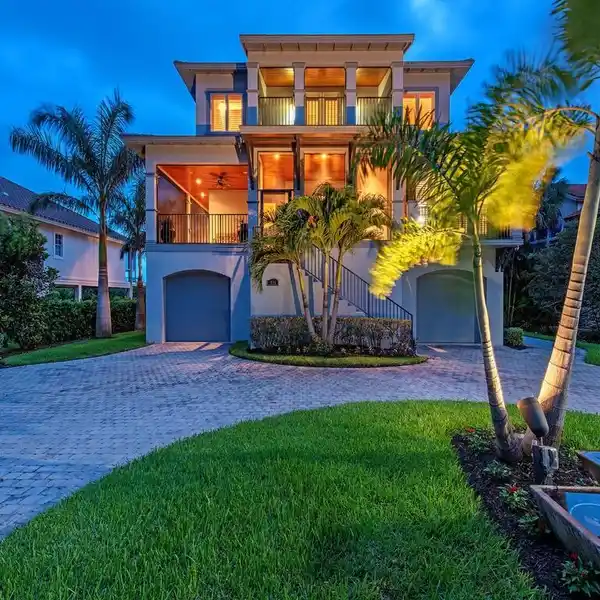 WATERFRONT ELEGANCE IN GATED HIDEAWAY BEACH