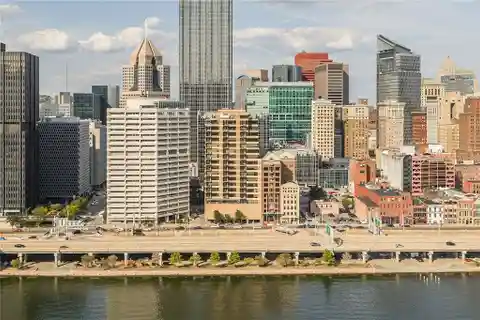 Secure Luxury Condo with Panoramic City and River Views