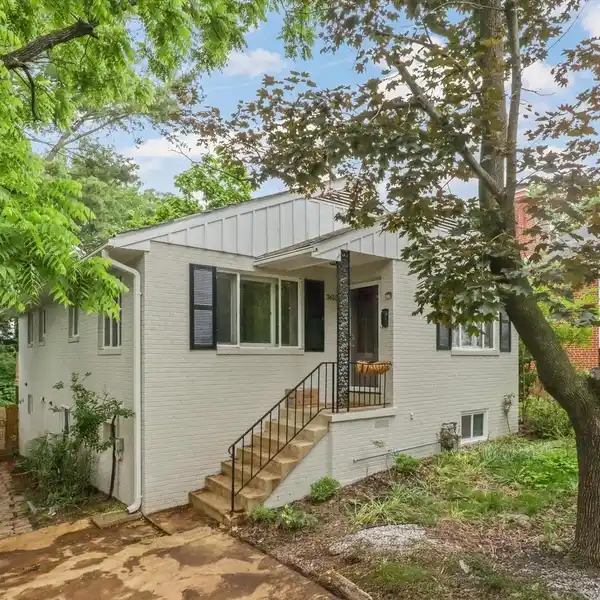 PEACEFUL MAYWOOD OASIS WITH VERSATILE LOWER LEVEL