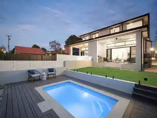 Luxury Duplex with Water Views and Alfresco Elegance