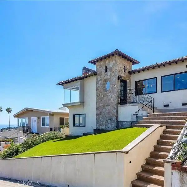 EXQUISITELY REMODELED HOME ON A SCENIC HILLSIDE