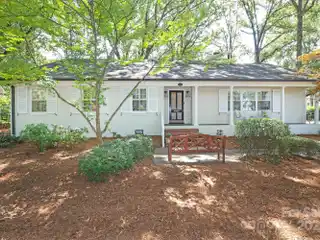 Charming One and a Half Story Home on a Private Corner Lot