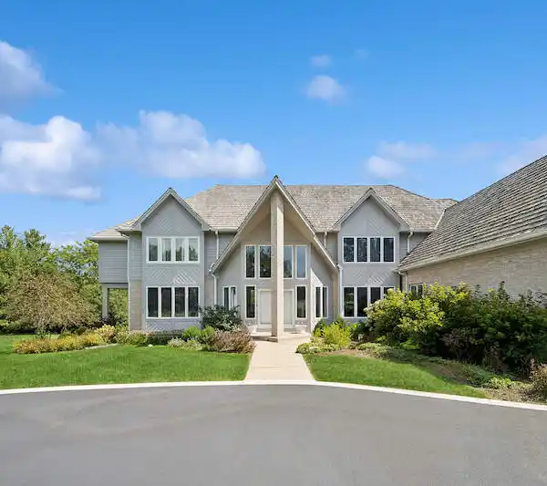 OWN A CUSTOM HOME ON OVER TWO ACRES