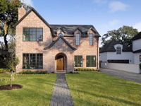 TUDOR-INSPIRED NEW HOME IN PEMBERTON HEIGHTS
