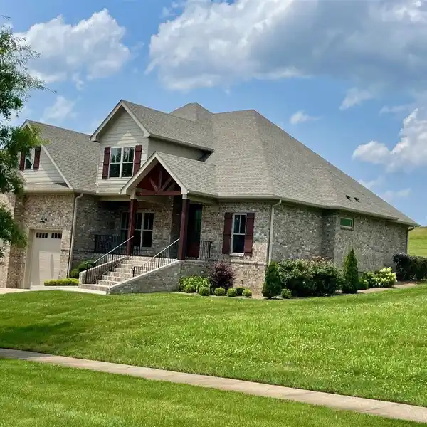 CUSTOM HOME IN THE PRESTIGIOUS OLDE STONE GOLF COURSE COMMUNITY