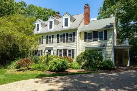 Timeless Colonial Charm on Private Acre Lot