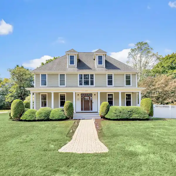 TIMELESS LUXURY ON SERENE TREE-LINED STREET