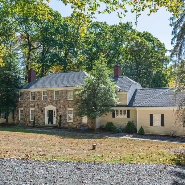 LARGE COLONIAL HOME ON OVER FIVE ACRES