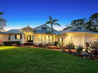 Exquisite Custom-built Coastal Home in a Gated Waterfront Community