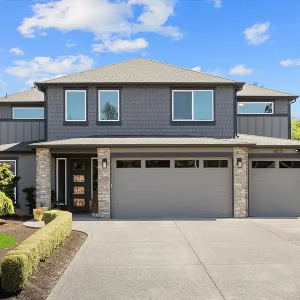 STUNNING ESTATE NESTLED ON A BEAUTIFULLY LANDSCAPED ACRE