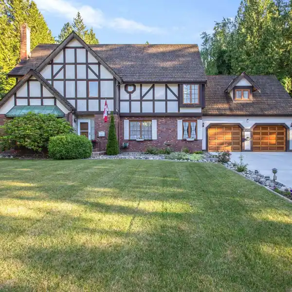 CUSTOM HOME ON OVER AN ACRE IN SOUGHT-AFTER CEDAR RIDGE