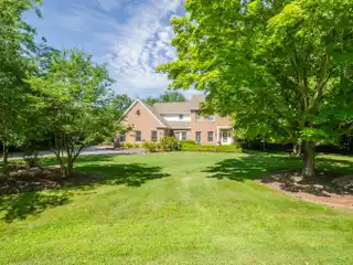 Architecturally Designed Custom Home on a Lush Acre-plus